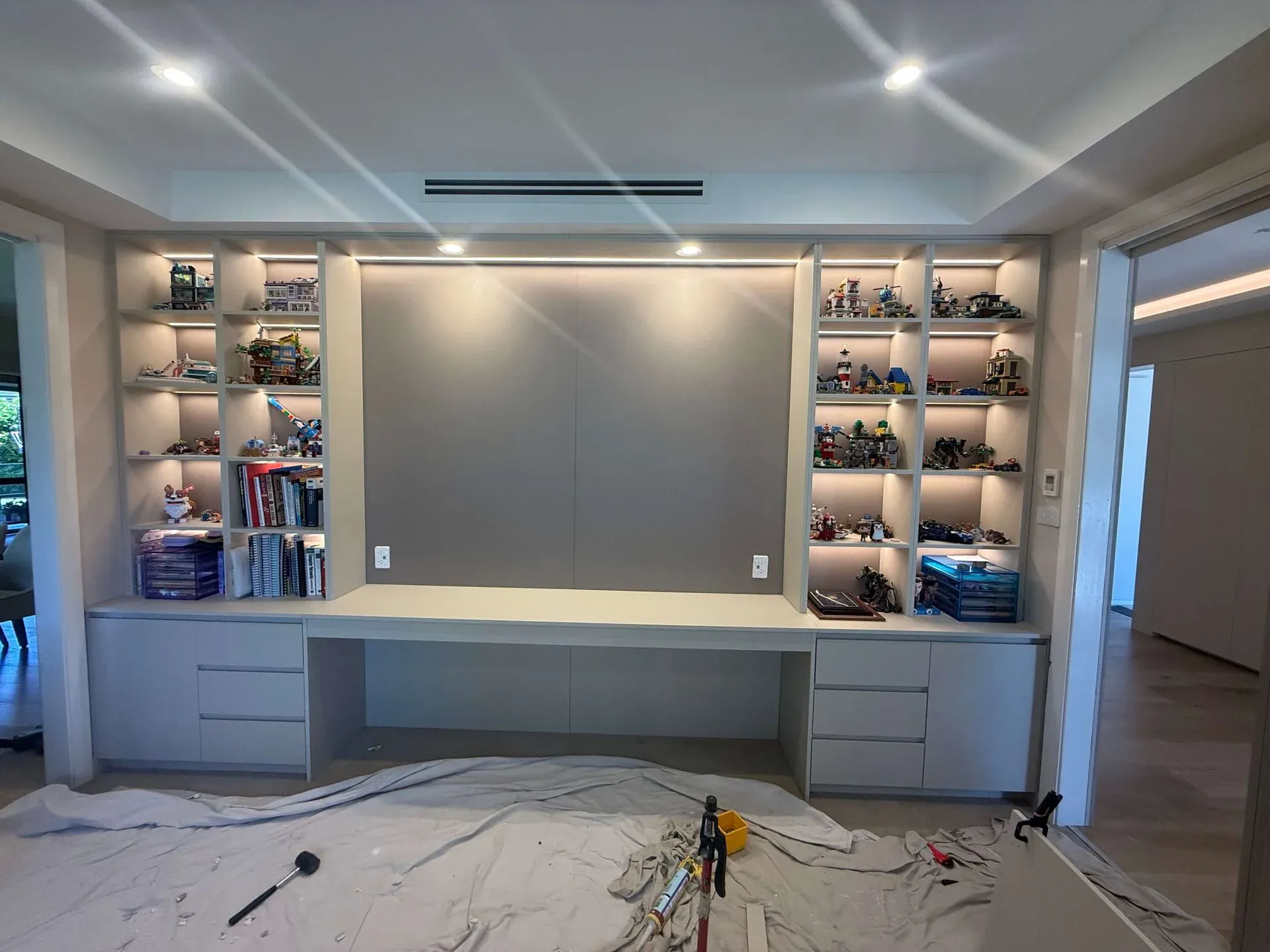 Beaumont Hills walk-in wardrobe with open shelving and display lighting