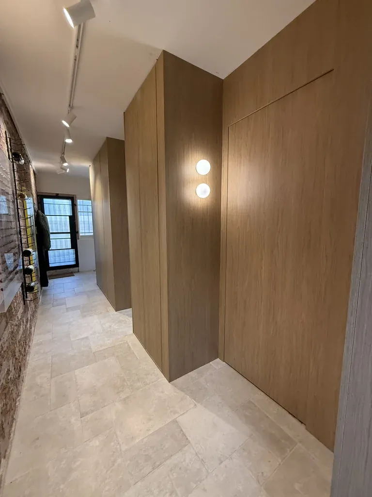 Darlinghurst corridor wall cladding running full length to front door
