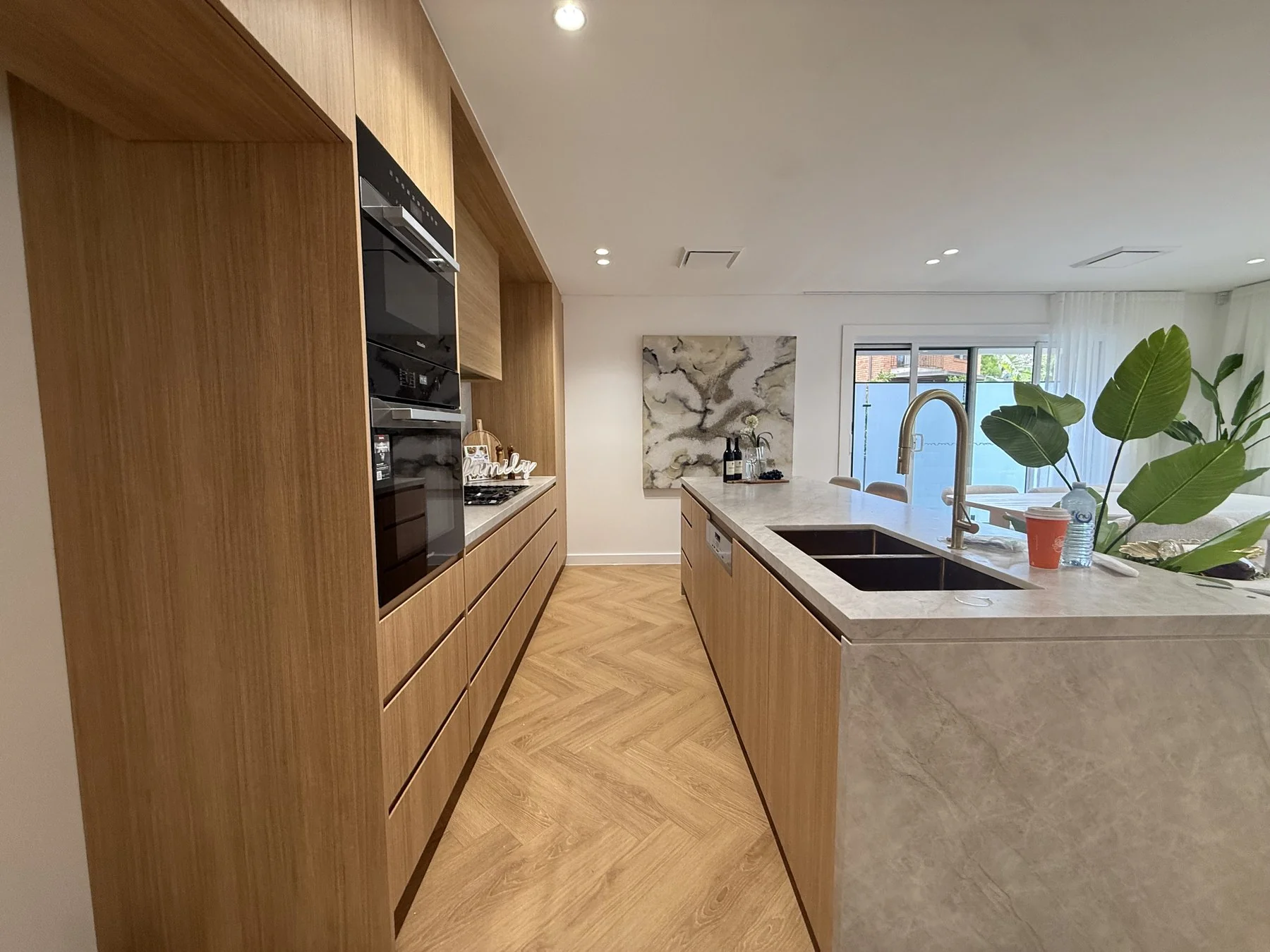 Epping kitchen sink and splashback detail with overhead cabinetry