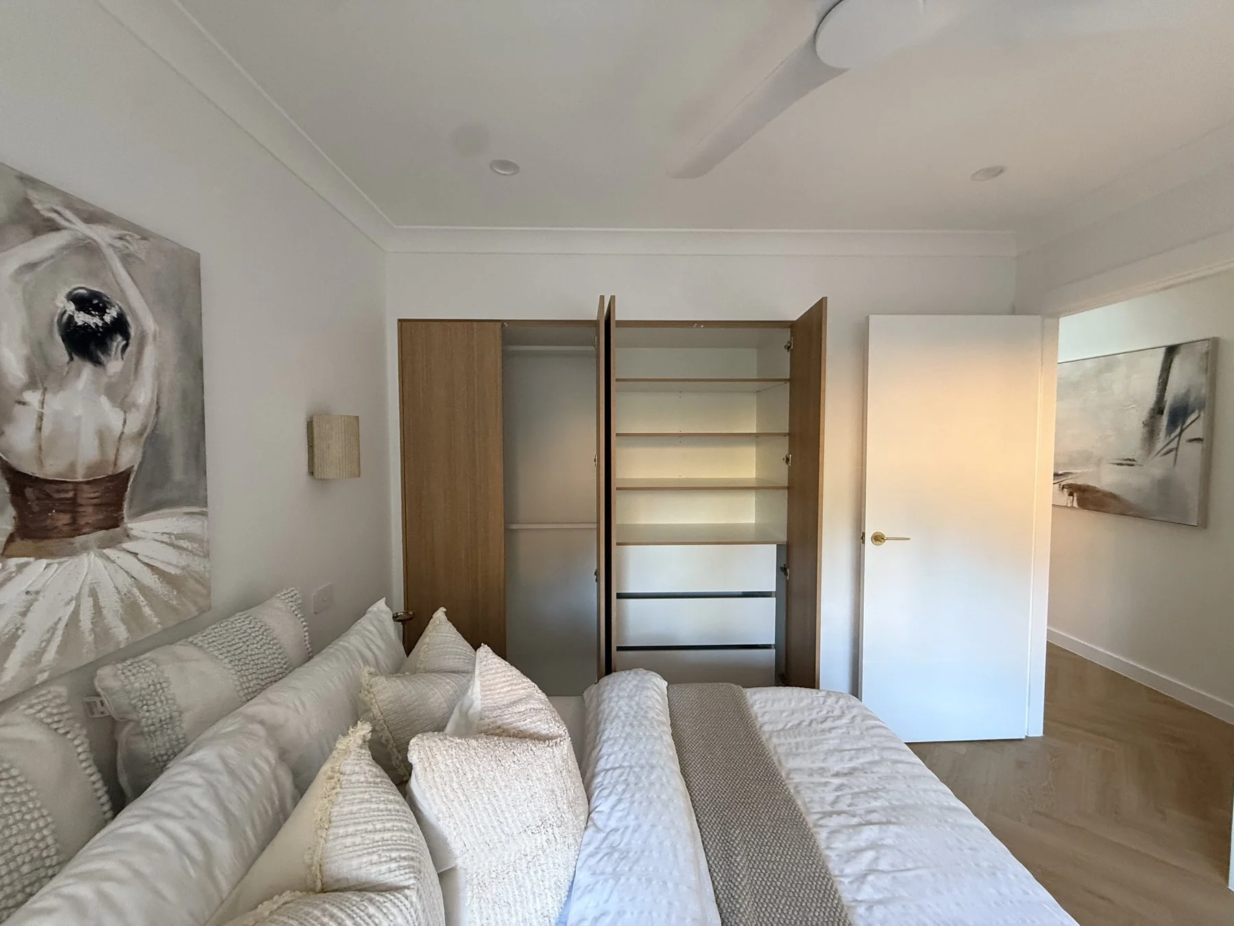 Epping wardrobe door detail in Laminex Sublime Teak with fingerpull profile
