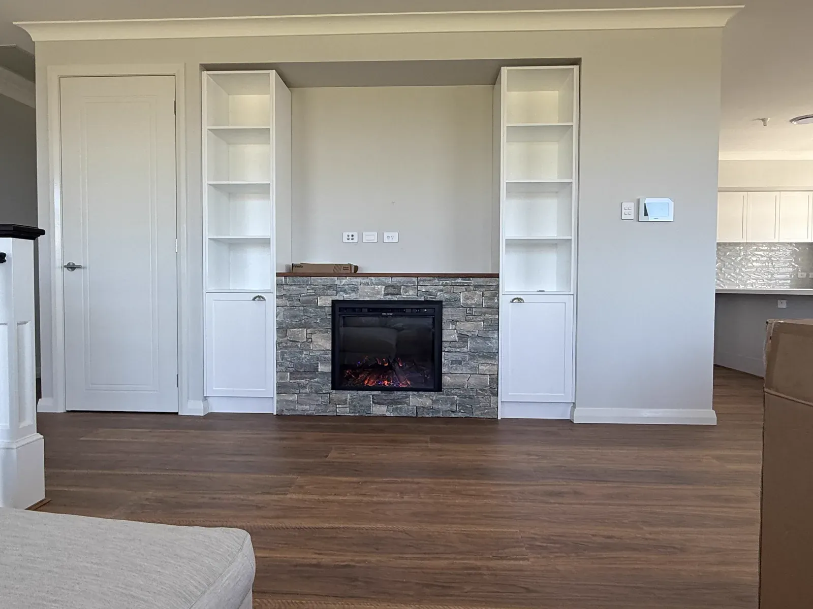 Kiama fireplace built-in storage and display shelving in Dulux Vivid White shaker