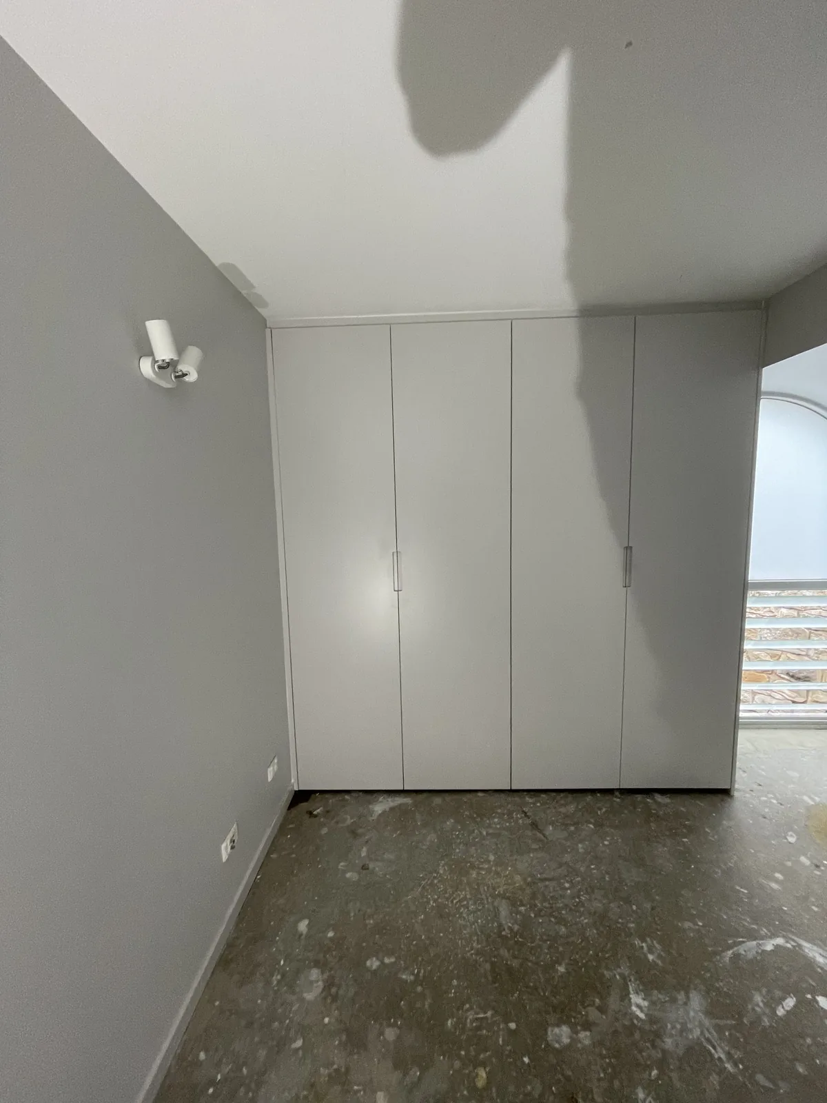 Built-in wardrobe in Vivid White 2pac with a J-groove pull in a Leichhardt new build