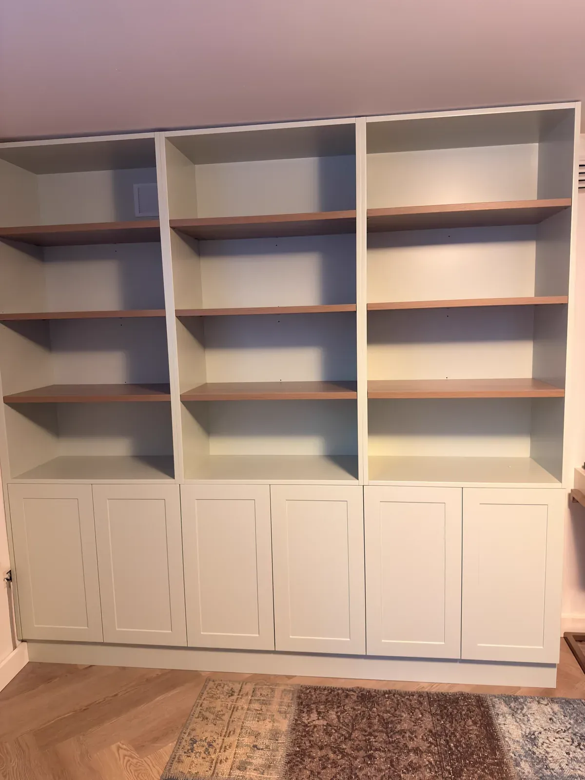 Neutral Bay study bookshelves — full height view in room context