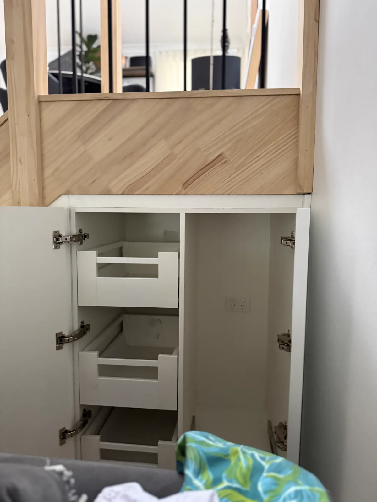 Neutral Bay understairs storage — second angle showing fluted panel detail
