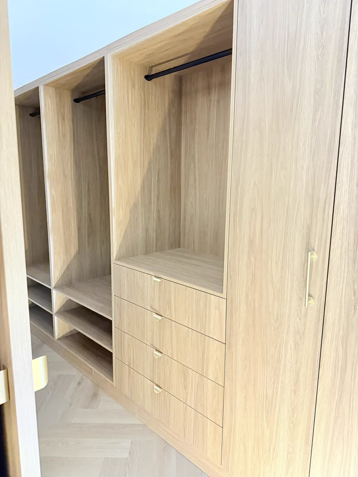 Neutral Bay walk-in wardrobe — detail of Polytec Prime Oak finish and joinery profile