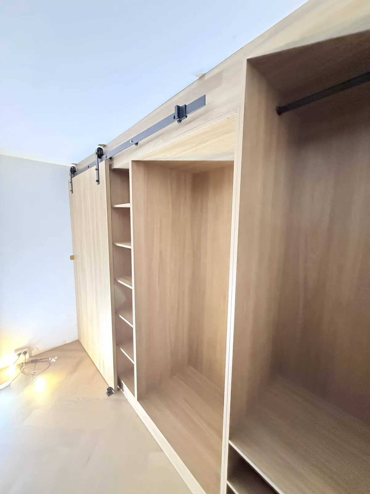 Neutral Bay walk-in wardrobe — upper shelving and hanging rail detail