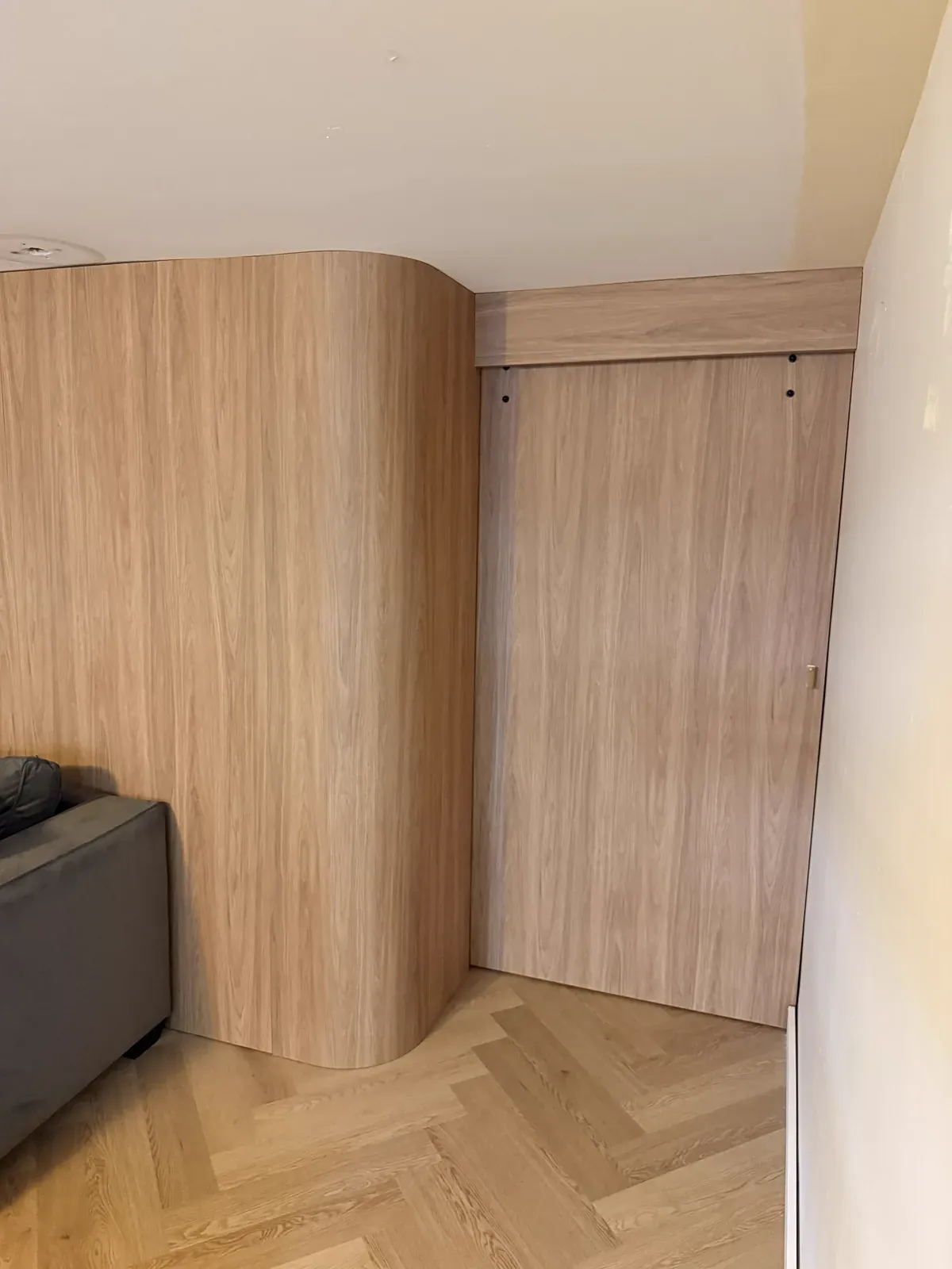 Neutral Bay walk-in wardrobe — final angle showing barn door and full fitout