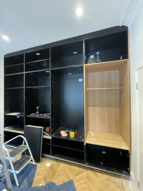 Mosman wardrobe panel and overhead storage detail
