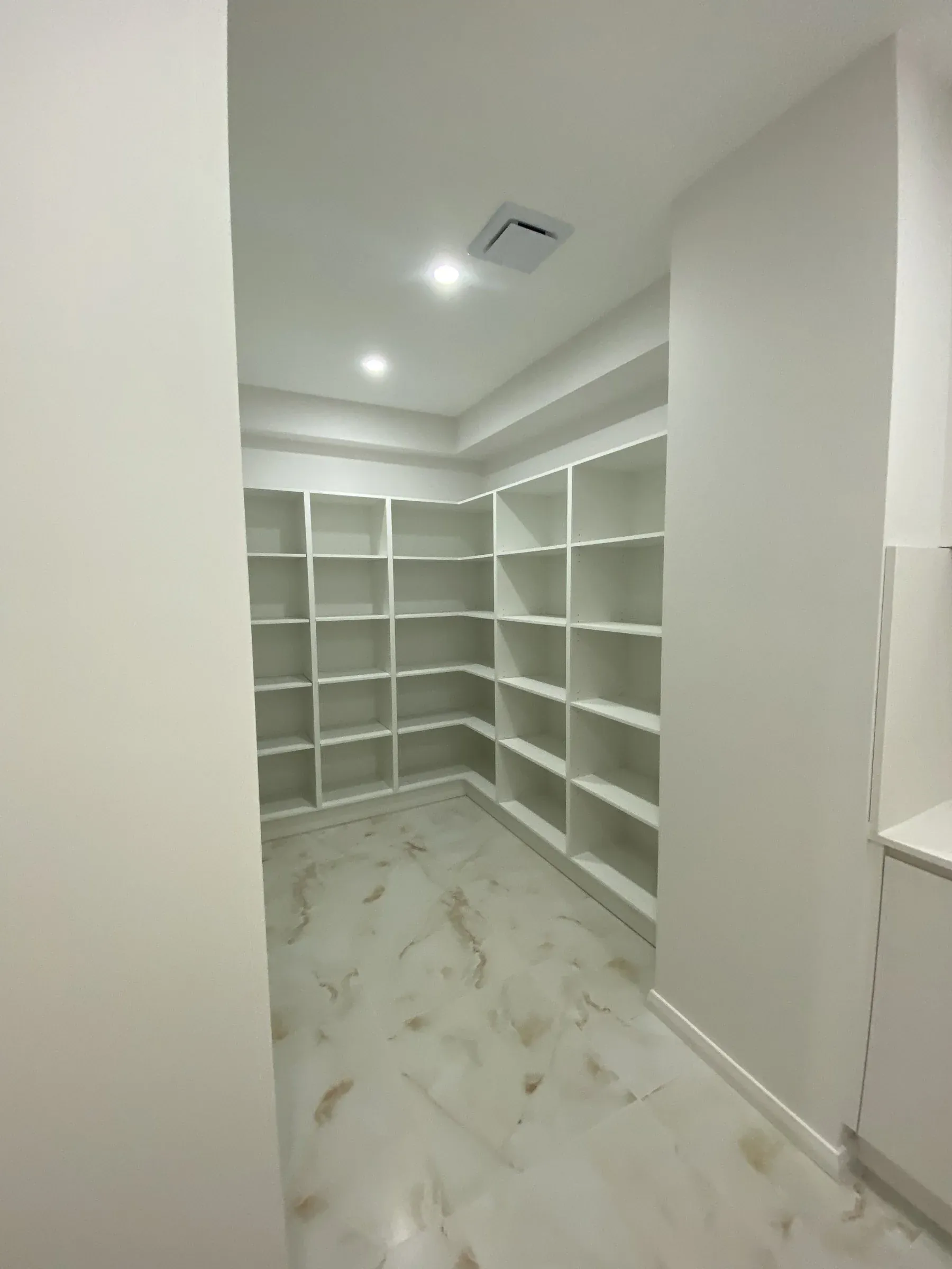 Monterey butler’s pantry with L-shape walk-in shelving