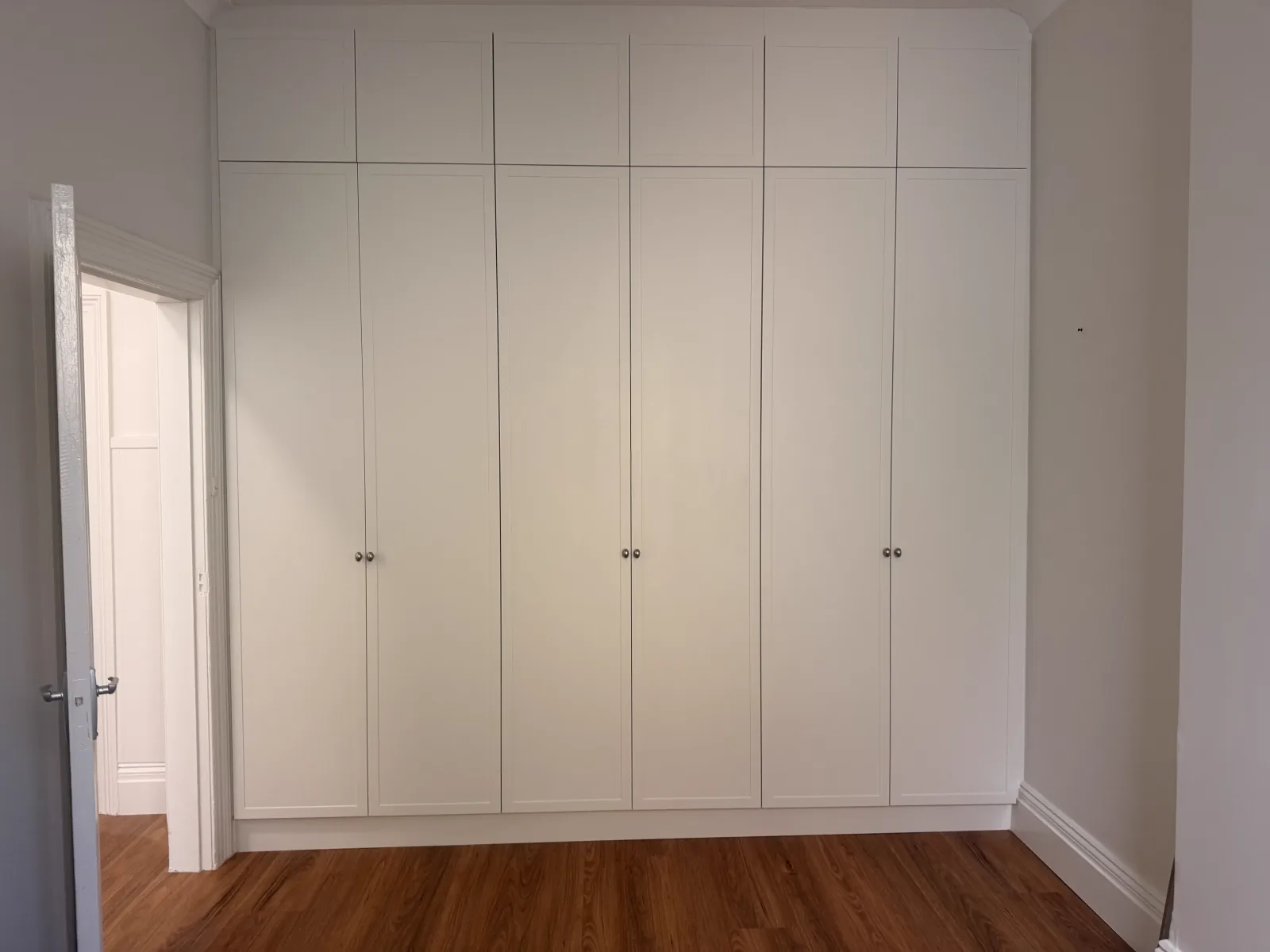 Redfern second bedroom 2pac wardrobe — Taubmans Aspen Snow with shaker doors