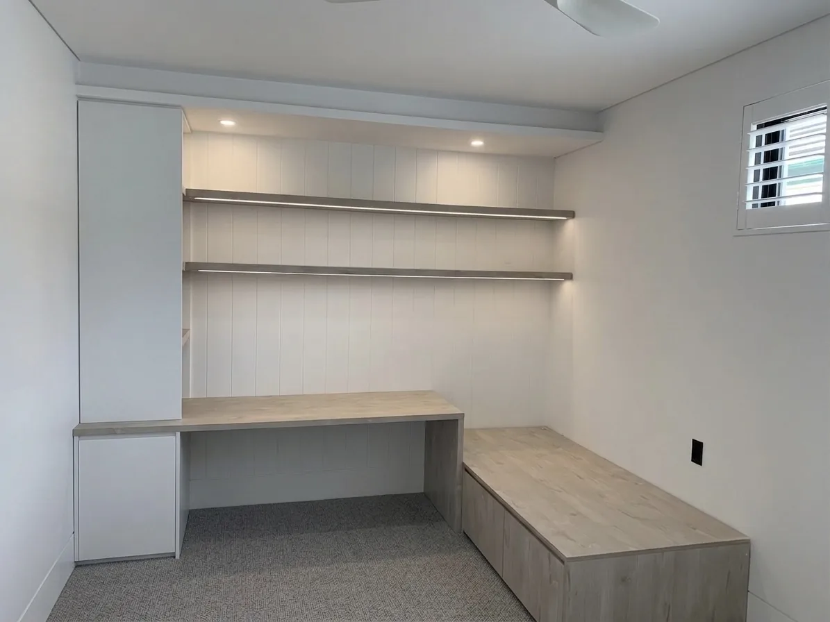 Polytec Angora Oak desk, bench seat and floating shelves in a Waverley kids room