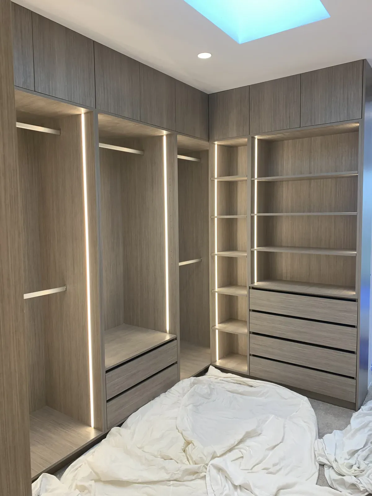 Open shelving with shoe storage and bag display in a Waverley walk-in robe
