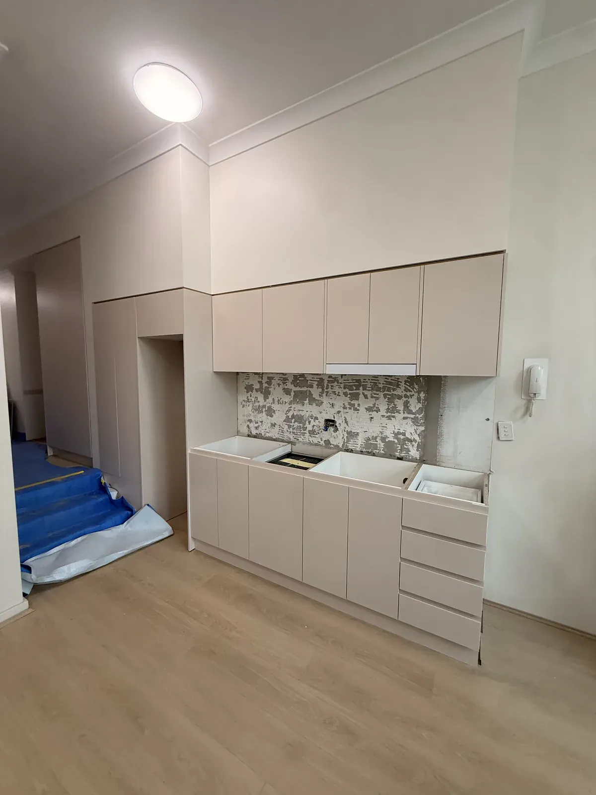 Kitchen cabinetry installed in a Willoughby apartment before the benchtop