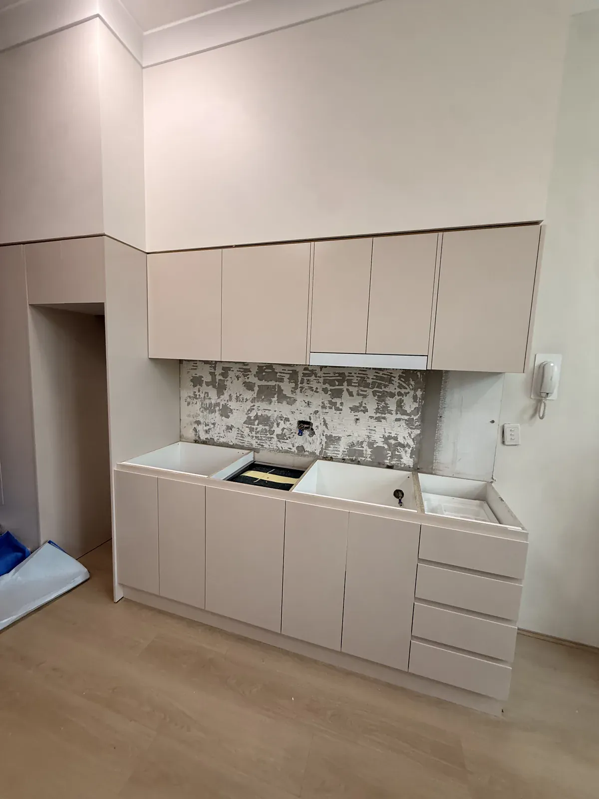 Installed kitchen cabinetry in a Willoughby apartment before stone