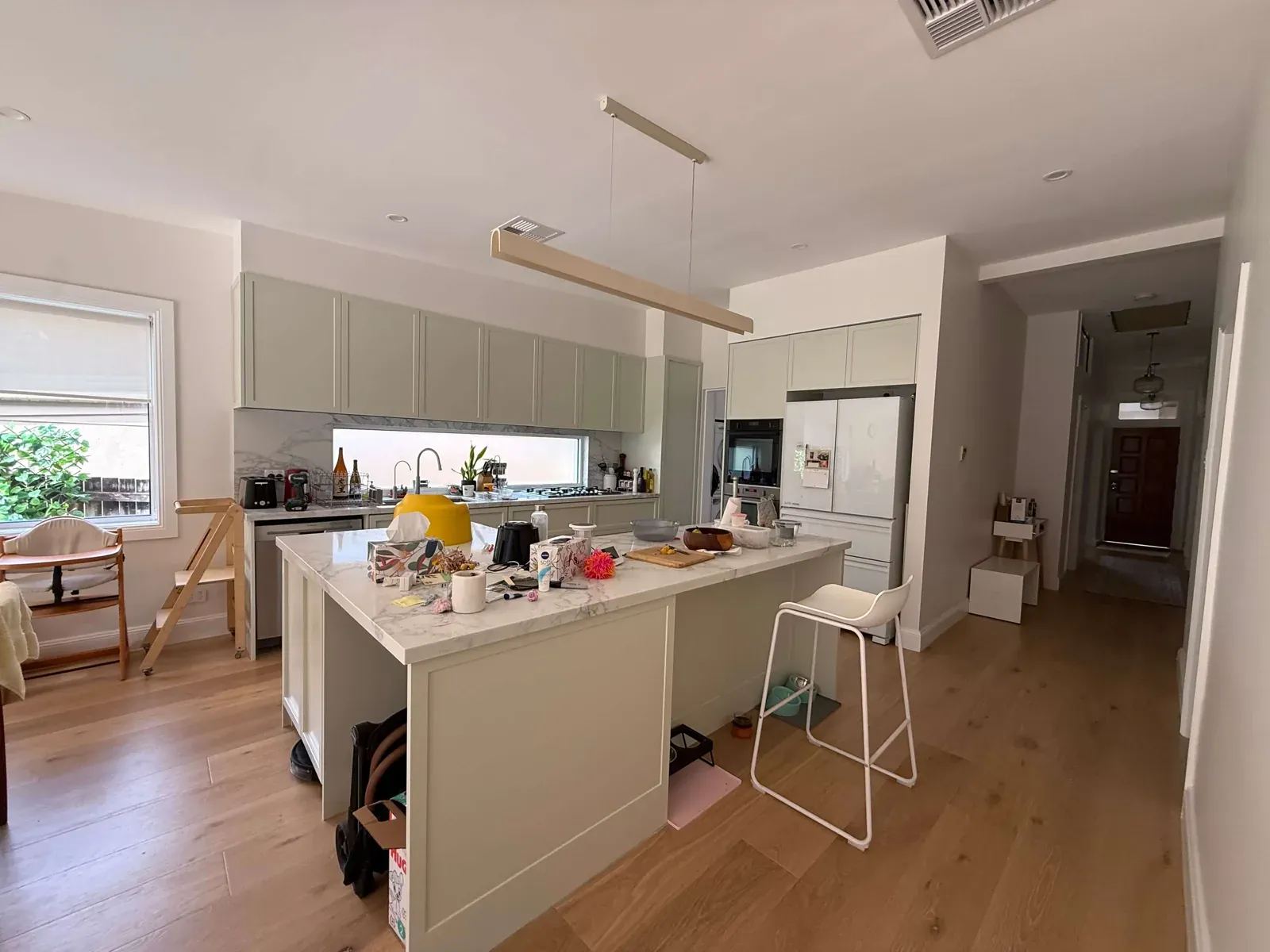 Willoughby kitchen island angle showing finger-pull groove detail