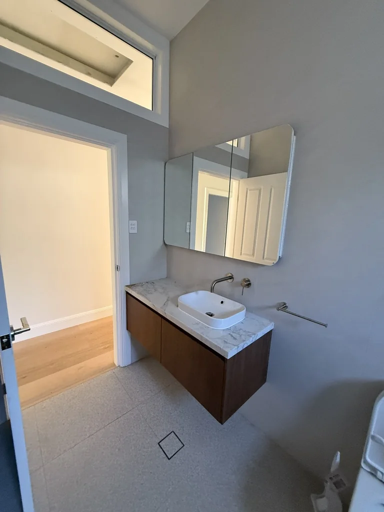 Willoughby single basin floating vanity — timber drawer cabinet and marble benchtop