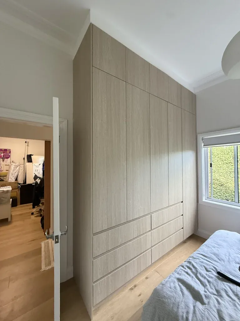 Willoughby Coastal Oak wardrobe — wide bedroom angle with timber finish
